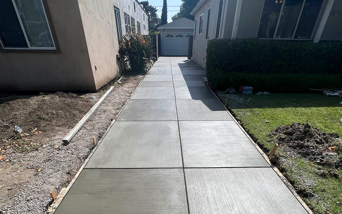 A left concrete driveway for a house